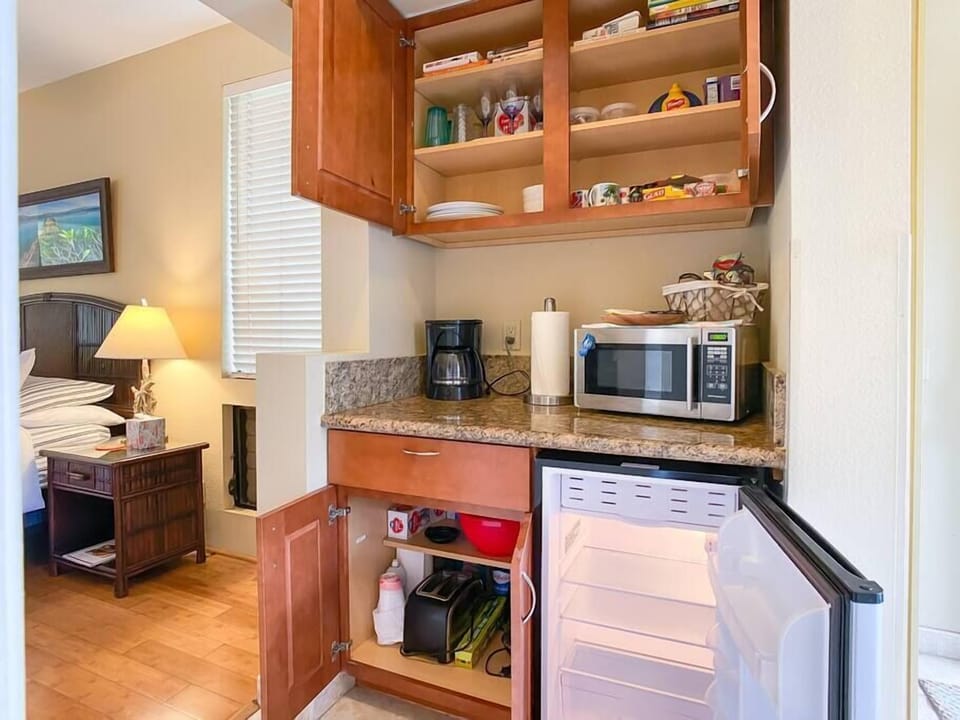 Microwave, toaster, coffee maker and mini fridge