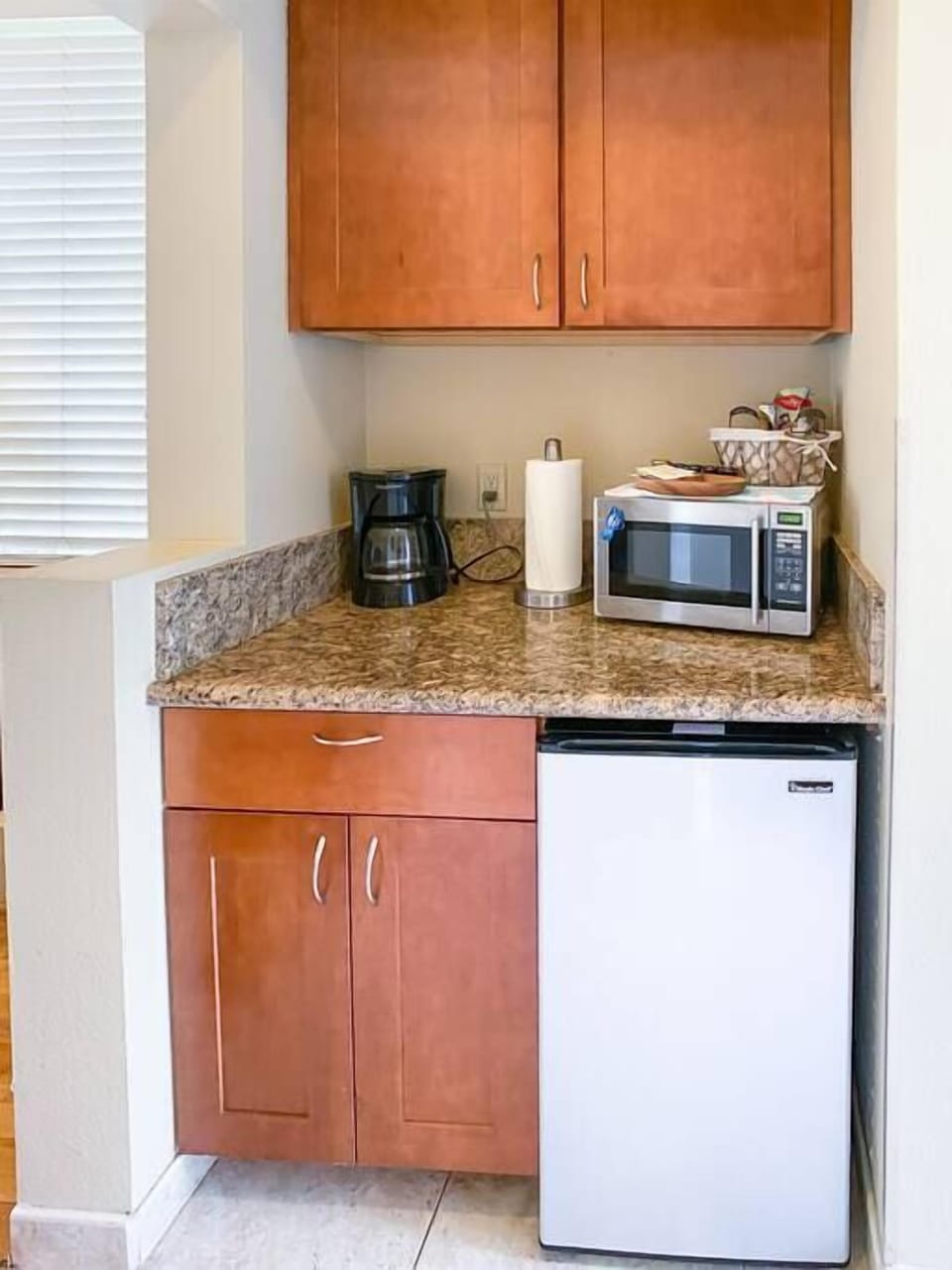 There is not a full kitchen but a nook with a toaster and mini fridge
