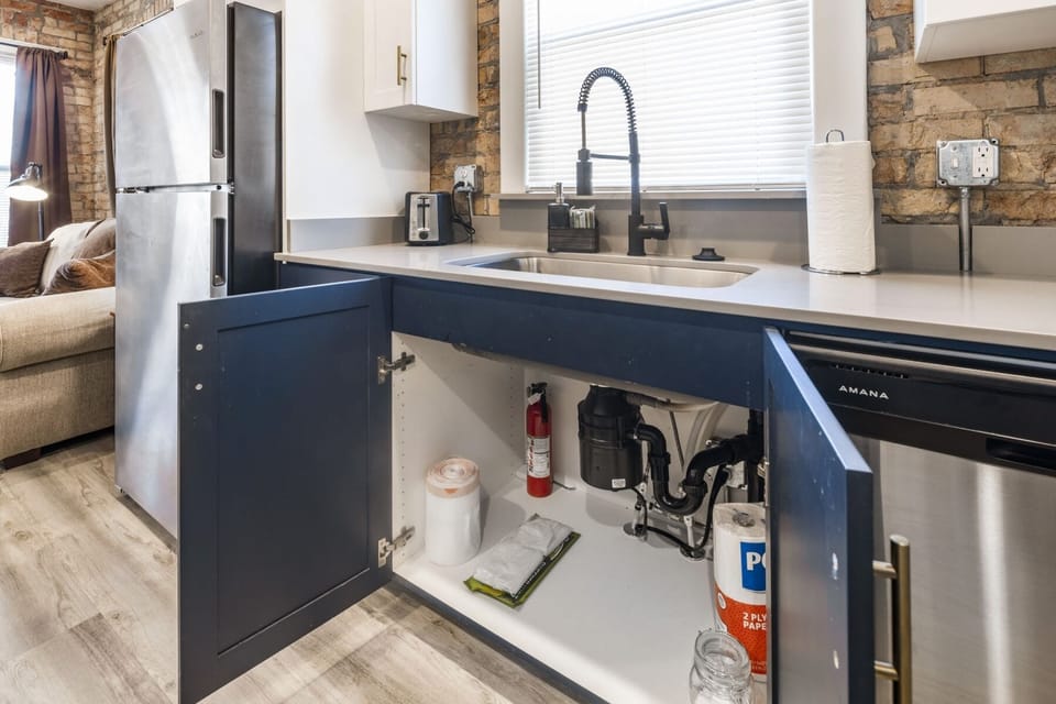 Garbage bags, fire extinguisher, paper towels and dish washer soap pods 