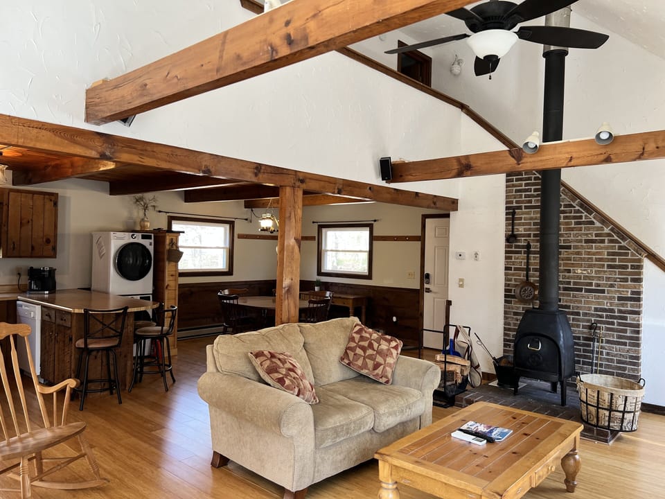 Open living area with view of dining area