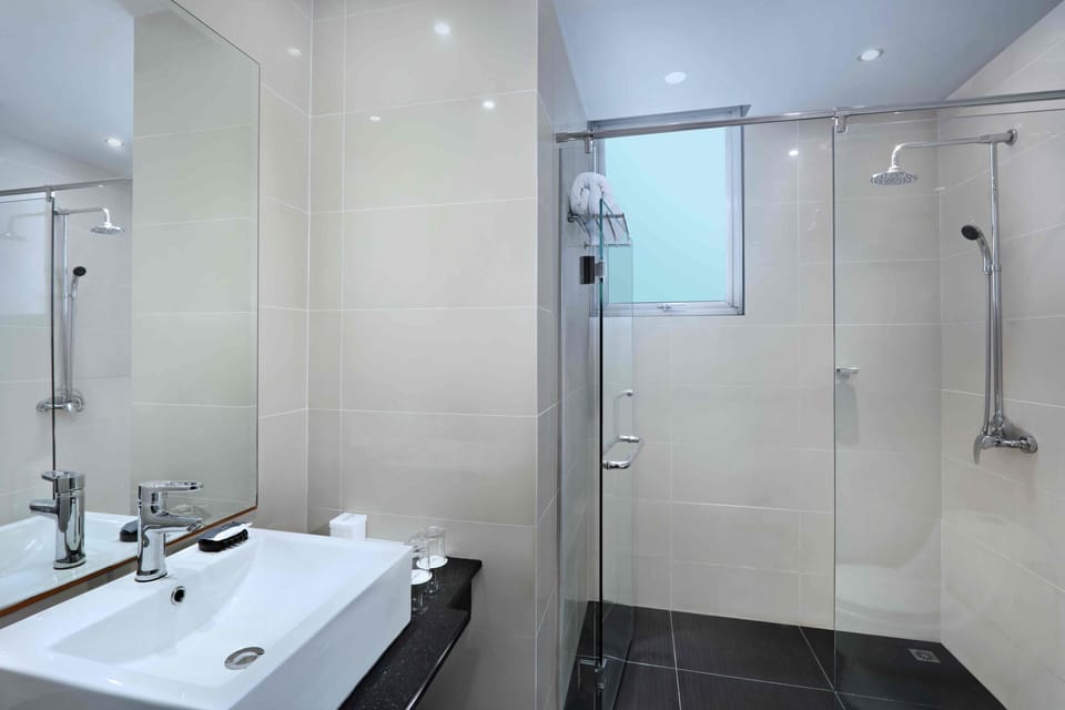 Shower, free toiletries, hair dryer, slippers