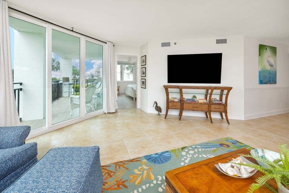 North Breakers 211 - Living room with ocean view and patio access