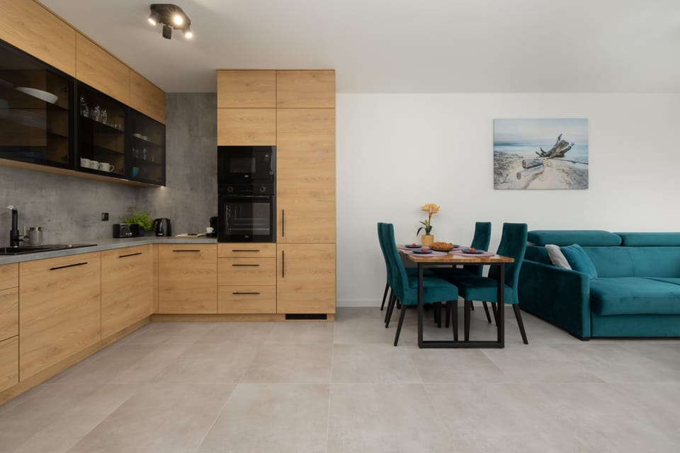Contemporary kitchen with a large workspace and functional layout.
