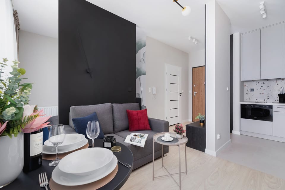 A view from the kitchen toward the living room, showcasing the seamless layout and stylish decor.
