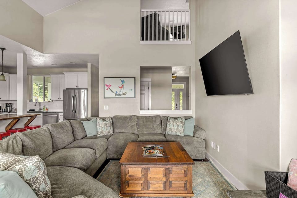 Spacious great room with oversized sectional seating, perfect for movie nights and group gatherings.