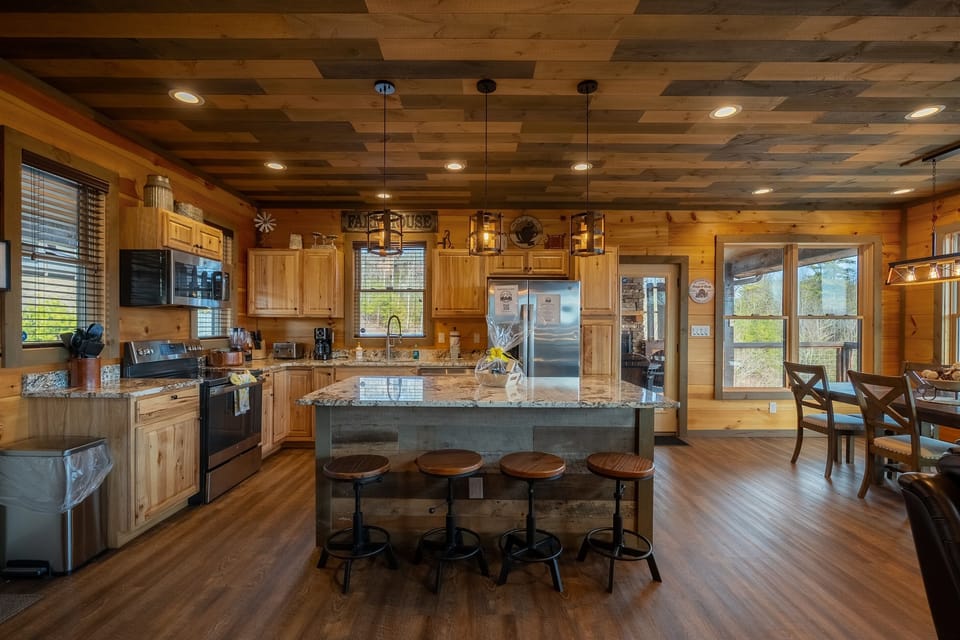 Huge Island with bar stools.