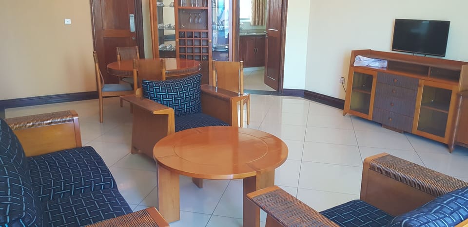 Family Apartment, 2 Bedrooms | Living area | 32-inch LED TV with satellite channels, TV