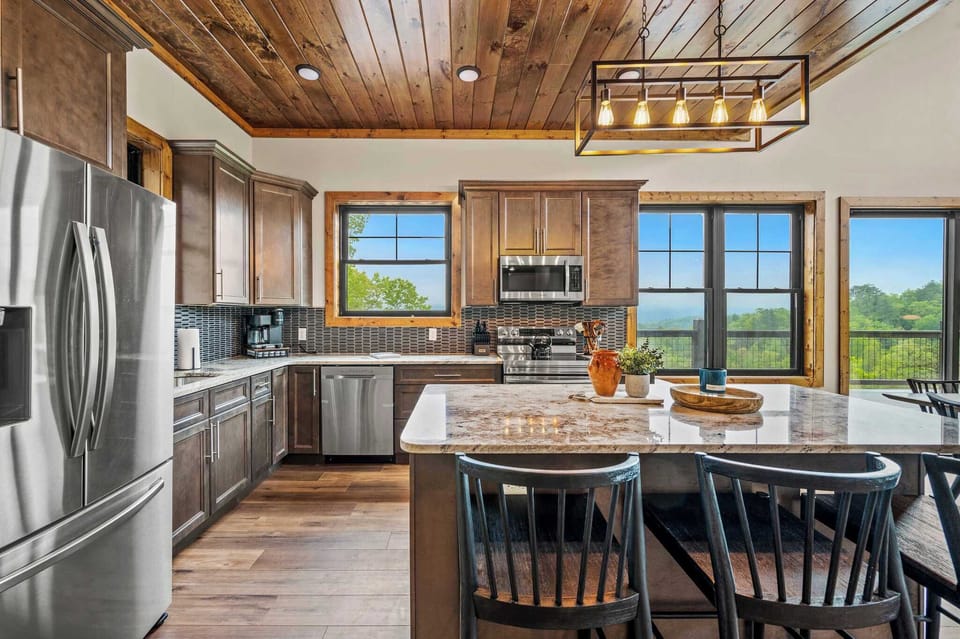 Another angle of the spacious kitchen complete with modern appliances.