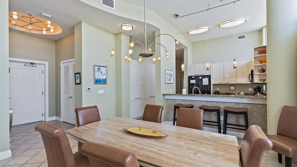 Dining area with plenty of seating perfect for family meals and gatherings.