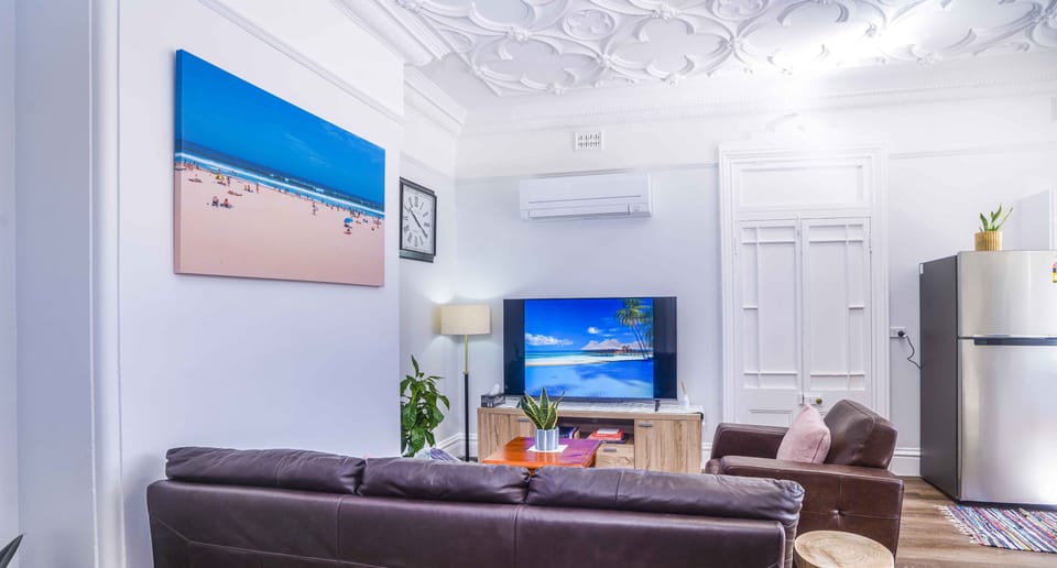 Lounge area with large HD TV.