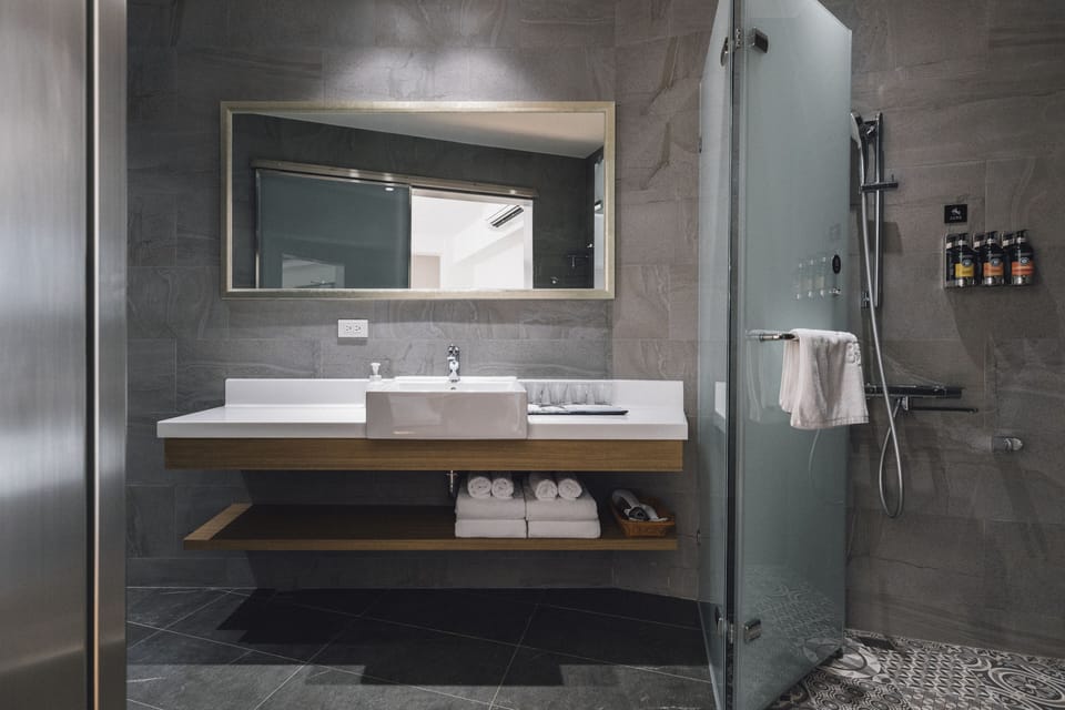 Comfort Quadruple Room | Bathroom | Designer toiletries, hair dryer, slippers, electronic bidet