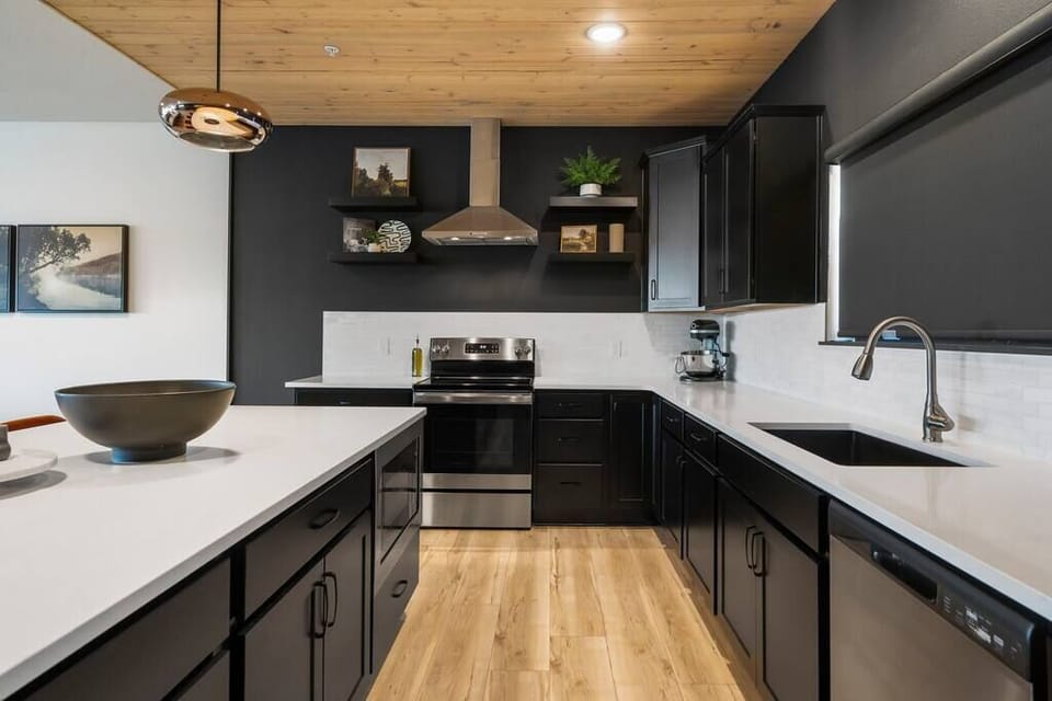 The kitchen is stocked with just about every appliance and utensil you could ever need.