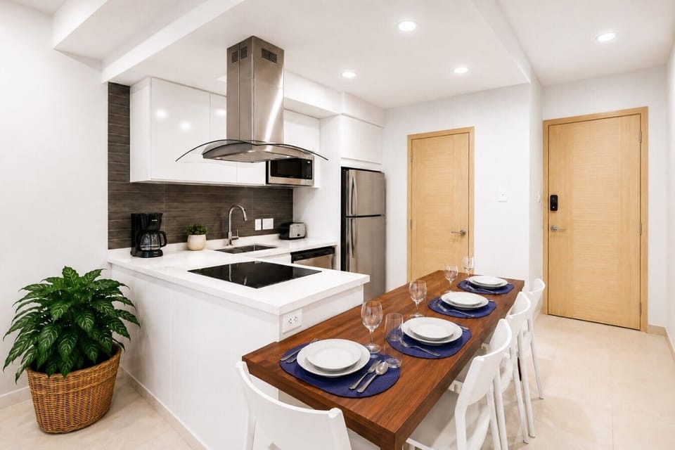Bright dining area with comfortable seating, perfect for meals, conversations, remote work, and relaxation