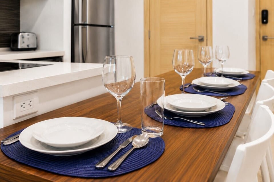 Bright dining area with comfortable seating, perfect for meals, conversations, remote work, and relaxation
