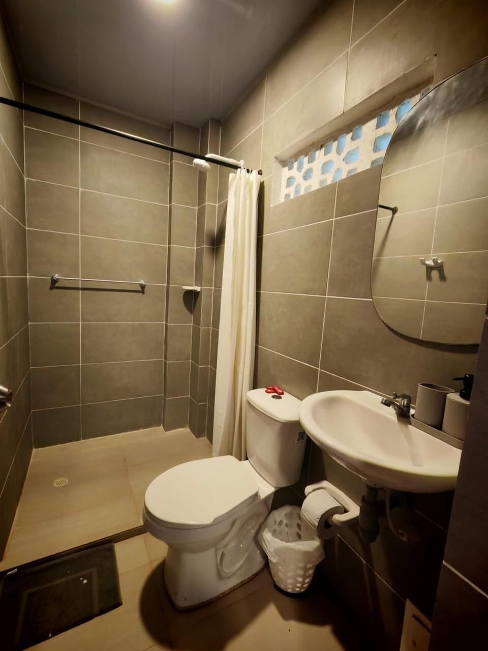 Shower, towels, soap, toilet paper