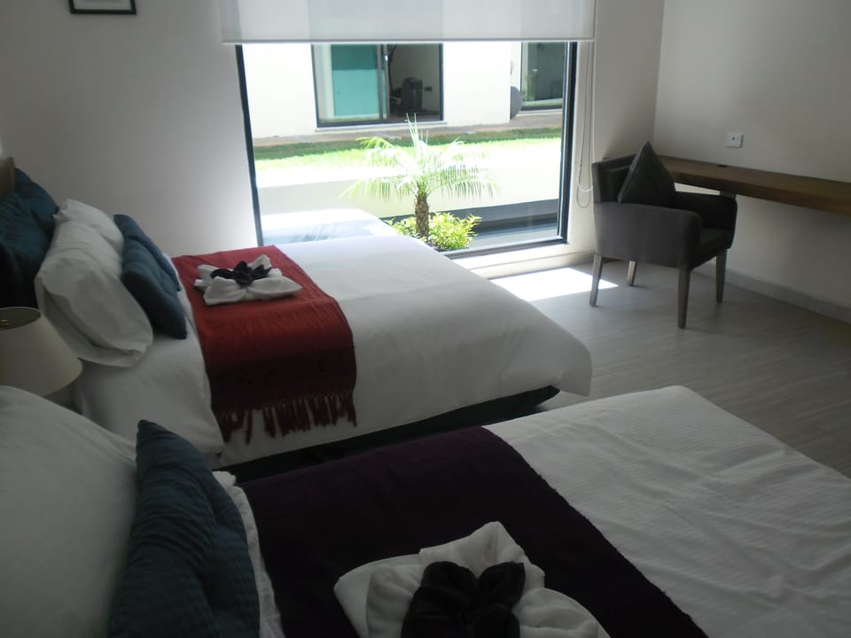 Double Room | In-room safe, iron/ironing board, cribs (free), WiFi (free)
