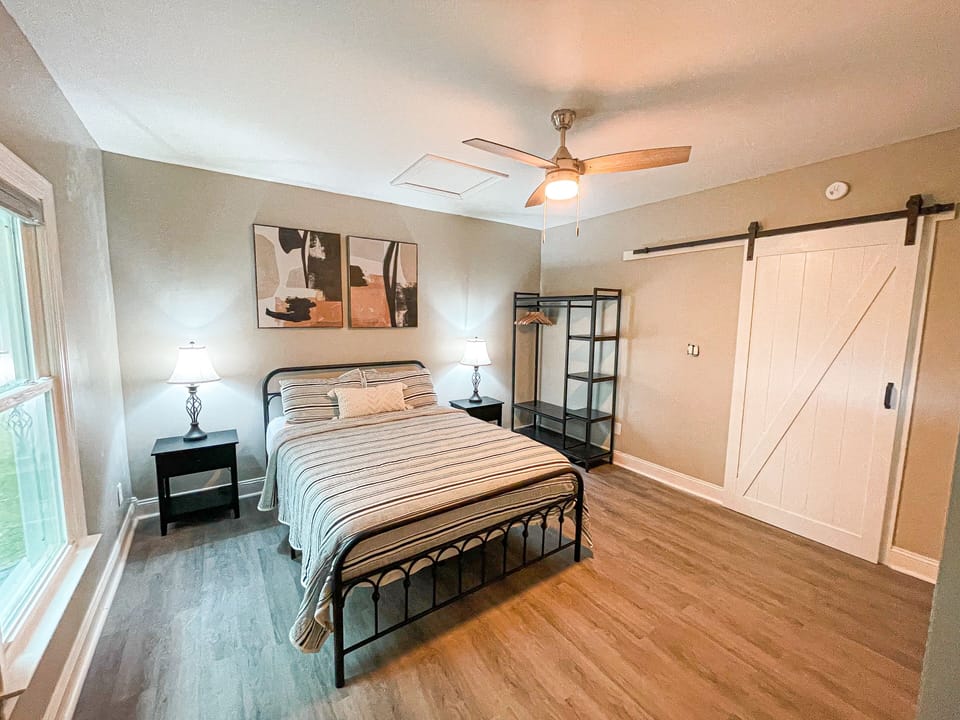 Queen bedroom with a storage wardrobe 