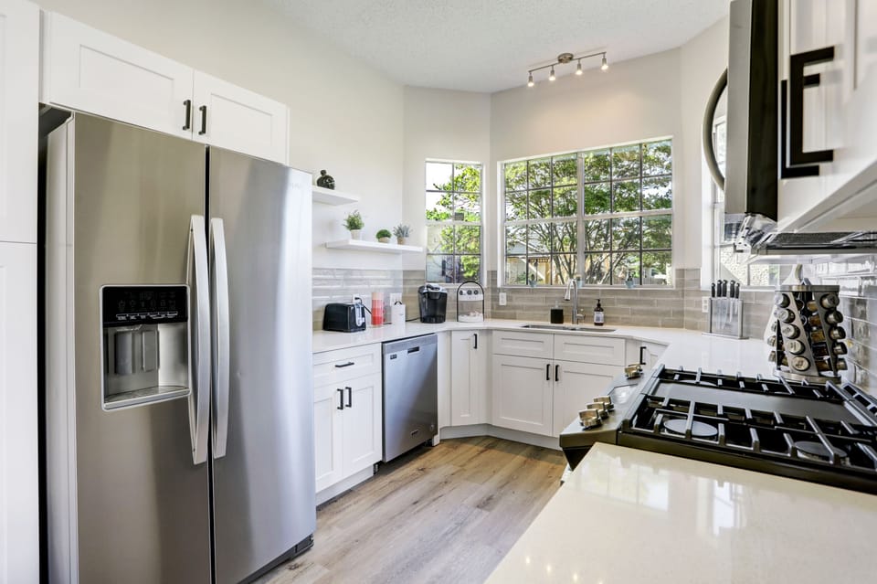 Kitchen are equipped with imported quartzite counters, new cabinets. 