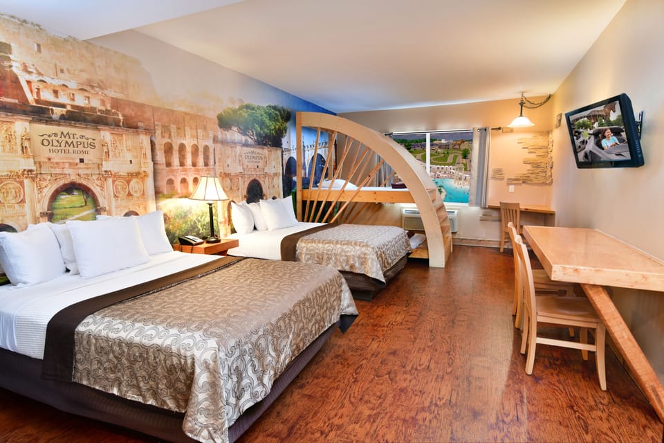 Desk, iron/ironing board, bed sheets