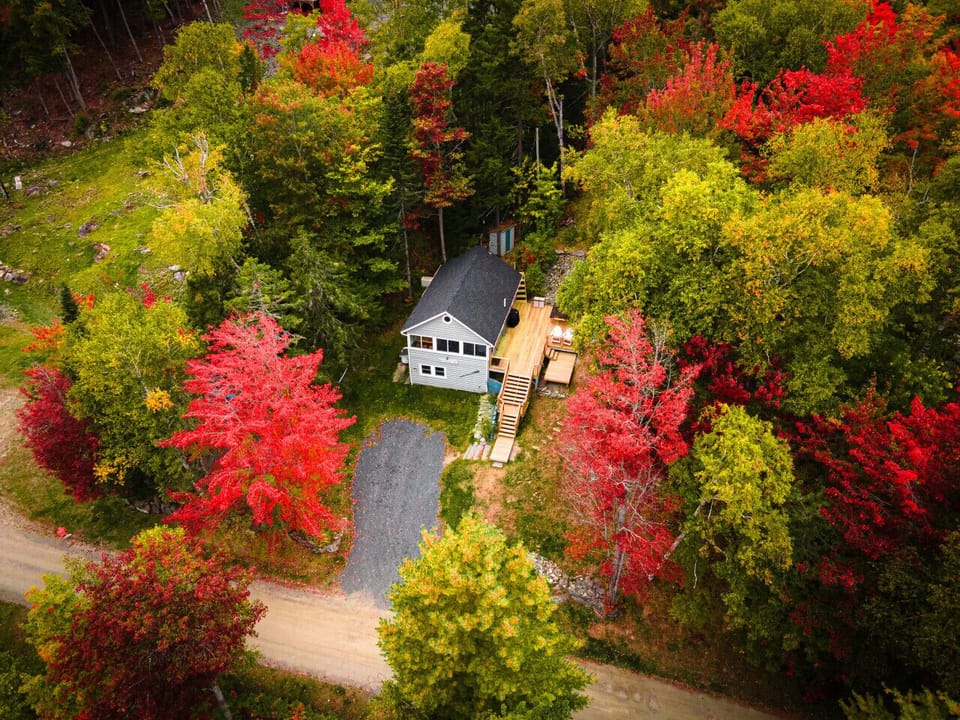 Stunning aerial view of the cabin and surroundings.