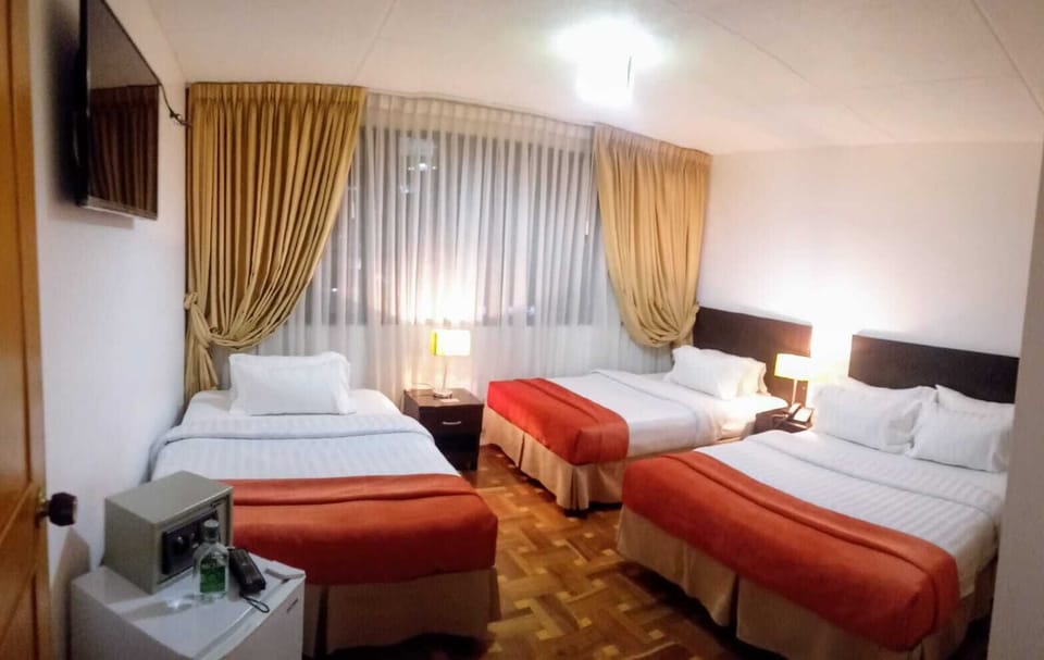 Standard Quadruple Room, 1 Bedroom | Premium bedding, down comforters, minibar, in-room safe