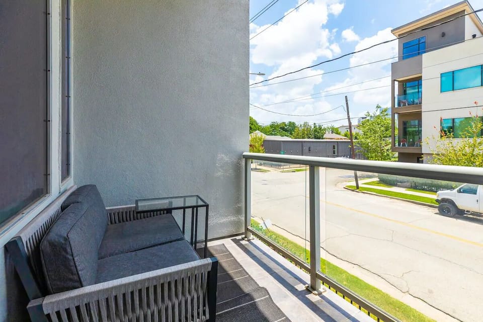 Enjoy fresh air and vibrant street views on your private outdoor escape!