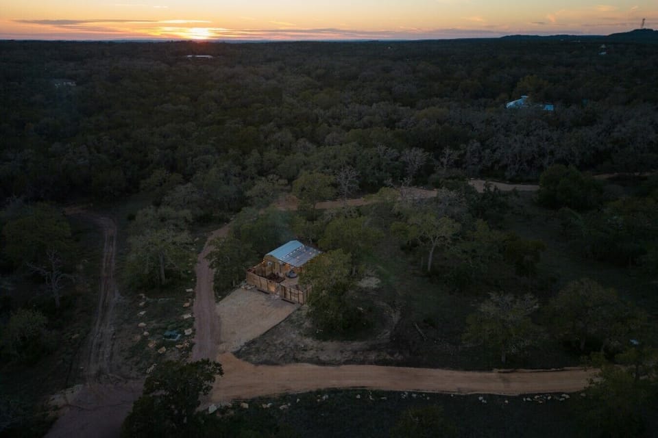 Secluded on 10 acres behind Wimberley Winery. A private escape surrounded by oaks.