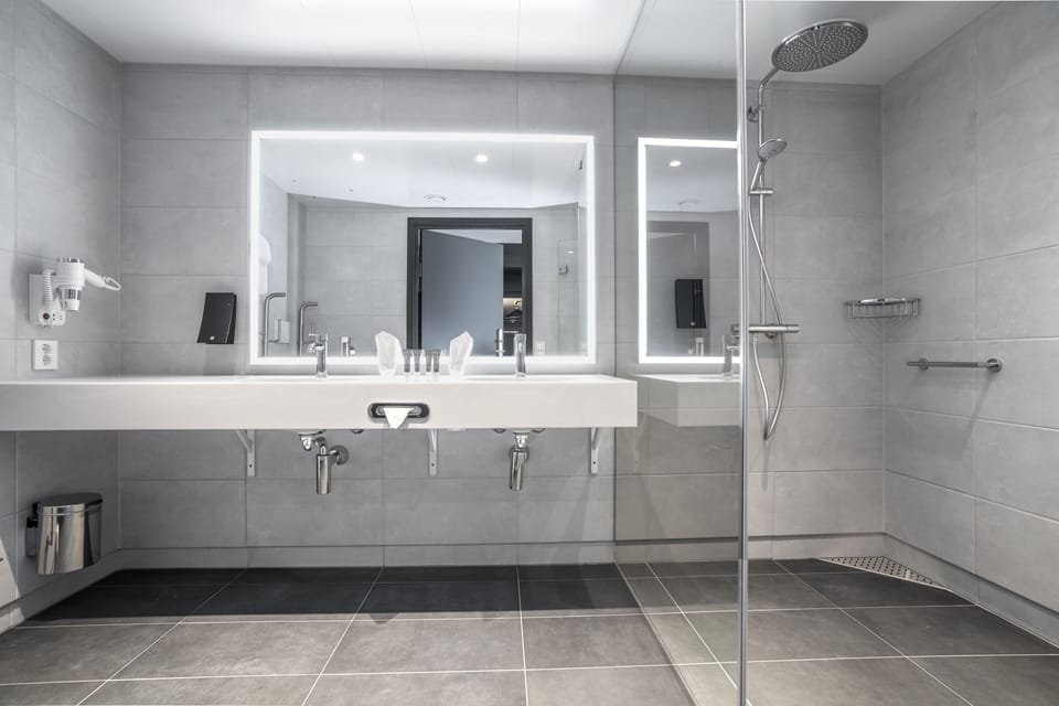 Shower, rainfall showerhead, hair dryer, heated floors