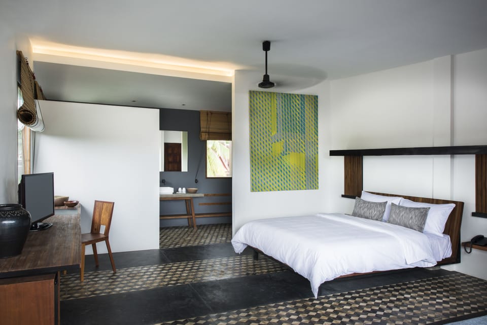 Deluxe Room | Premium bedding, minibar, in-room safe, individually decorated