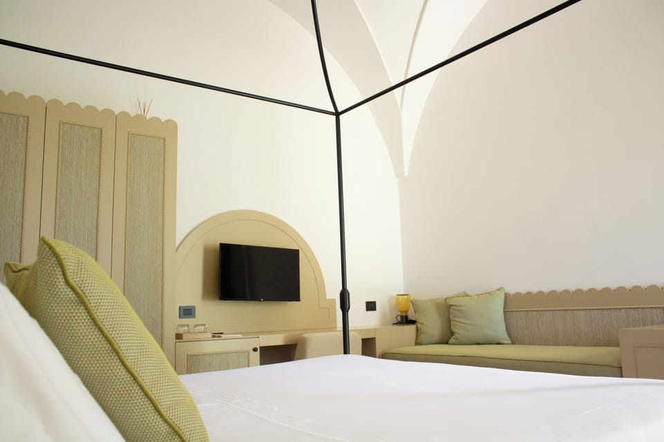 Superior Triple Room | Minibar, in-room safe, individually decorated, individually furnished