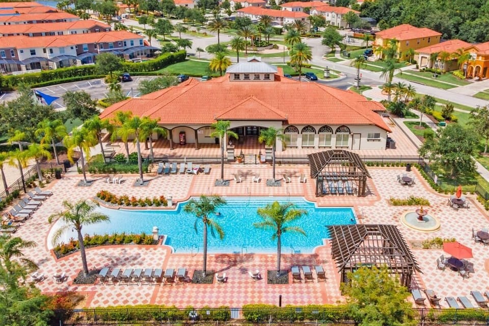 Resort-style pool area w/ loungers, inviting long sunny days.