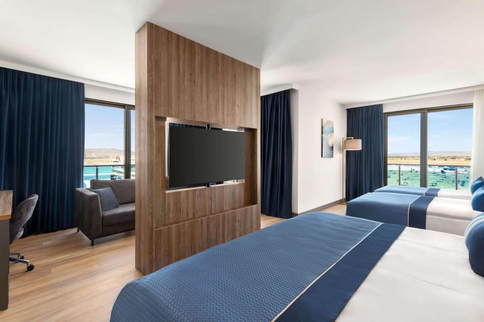 Deluxe Room, Corner | Premium bedding, Tempur-Pedic beds, minibar, in-room safe