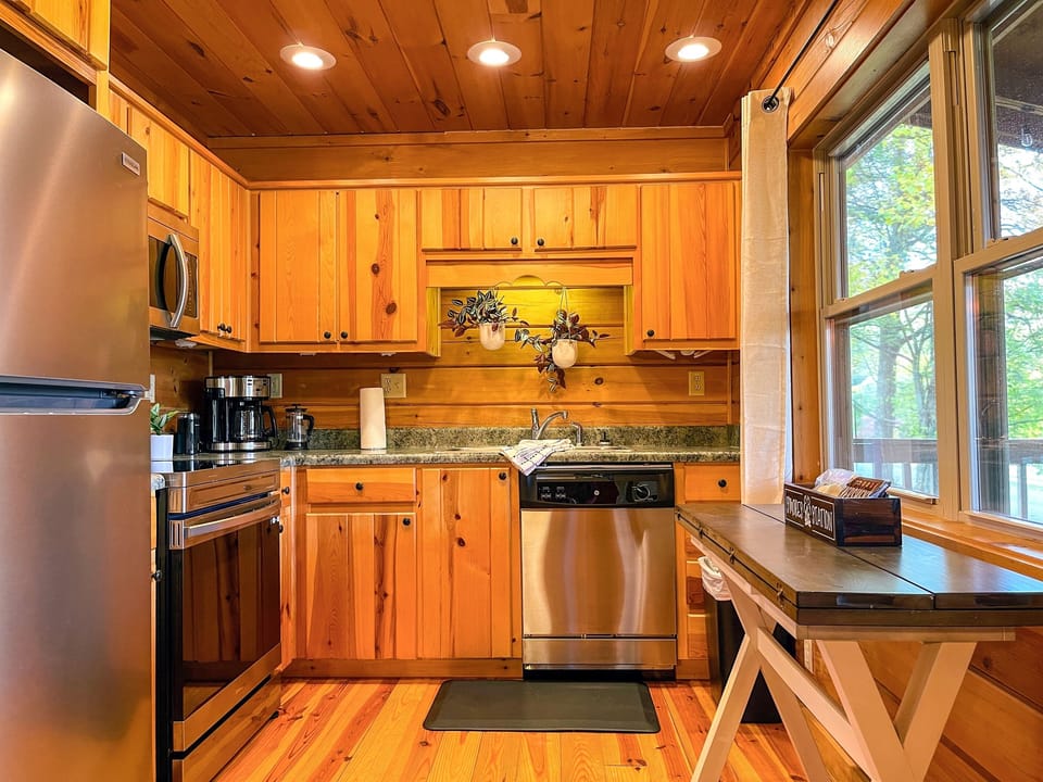 That’s right…enjoy 2 kitchens well-stocked kitchens under 1 roof so you can prepare a delicious home-cooked meals (view of Garnet's kitchen)
