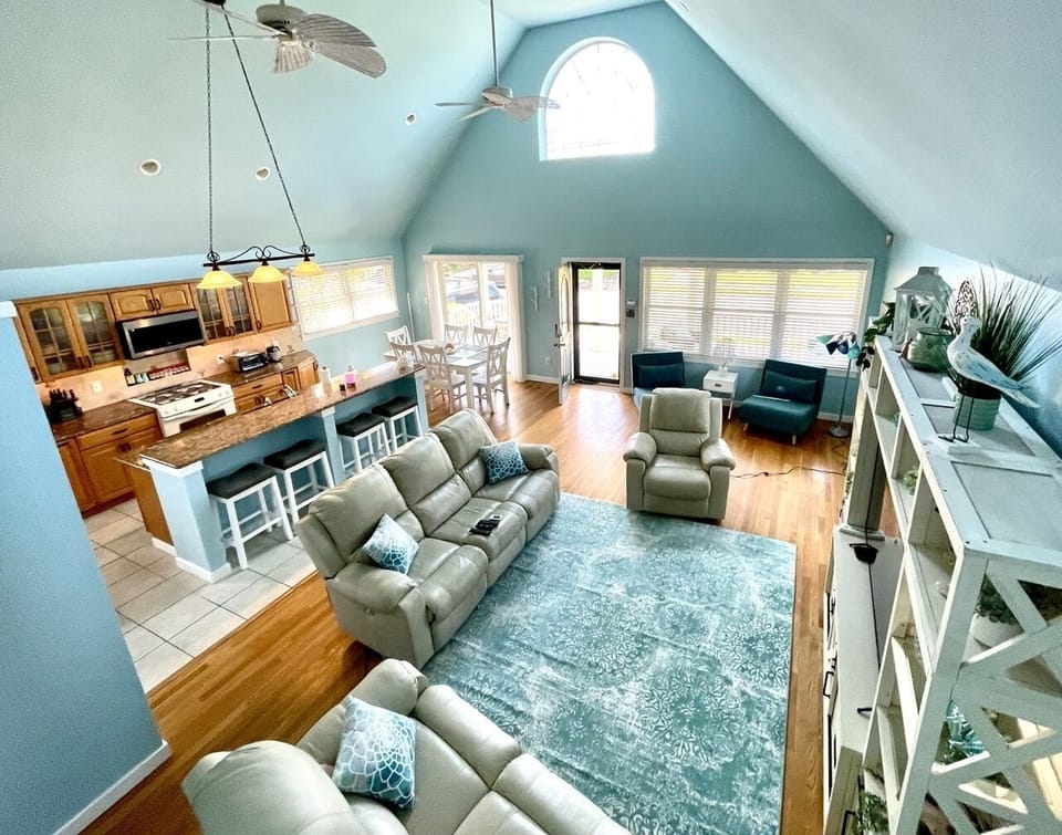Aerial view of open living room from stairs.