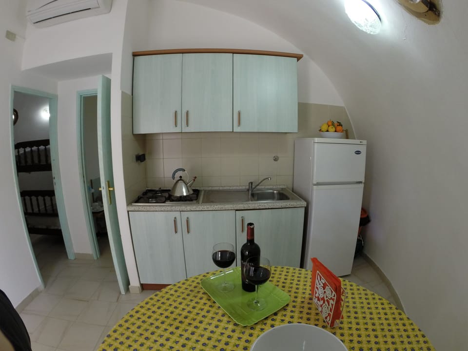 Standard Room, 2 Bedrooms, Beach View, Beachside | Private kitchenette | Full-size fridge, microwave, stovetop, coffee/tea maker