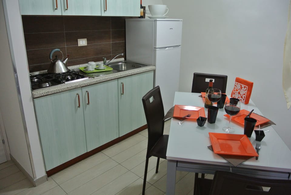Standard Room, 2 Bedrooms, Beach View, Beachside | Private kitchenette | Full-size fridge, microwave, stovetop, coffee/tea maker