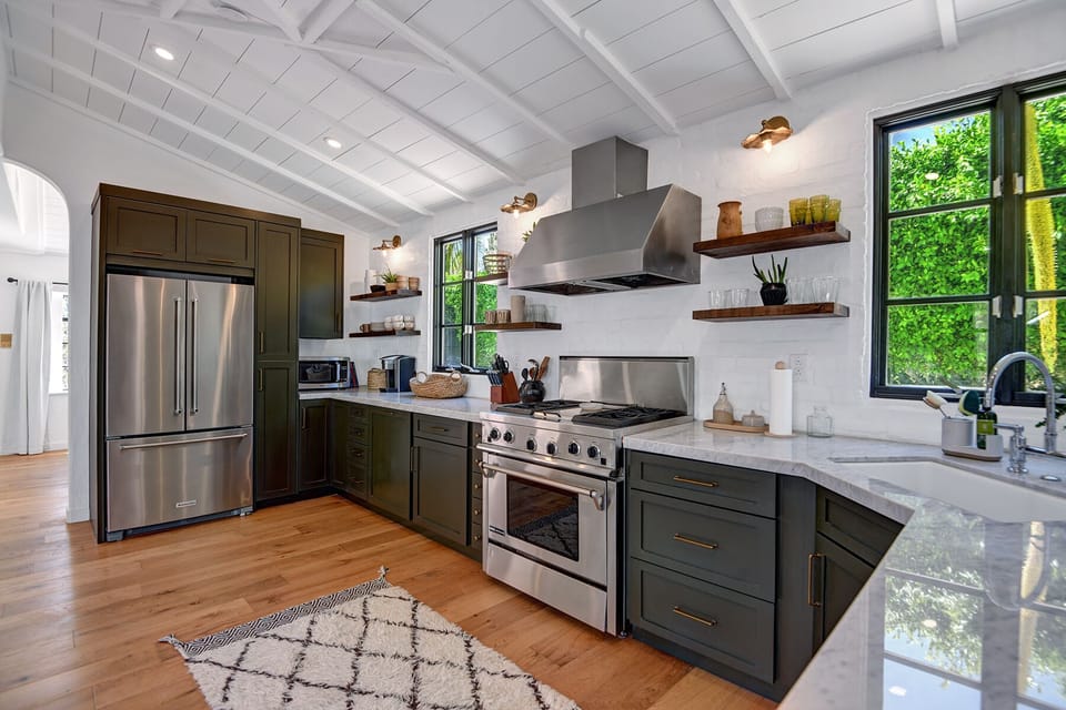 FULLY STOCKED CHEF'S KITCHEN INCLUDING A KEURIG COFFEE BAR WITH STARBUCKS.  GAS COOKTOP AND ALL THE ESSENTIALS.  OUTDOOR FEATURES A GAS BBQ GRILL.
