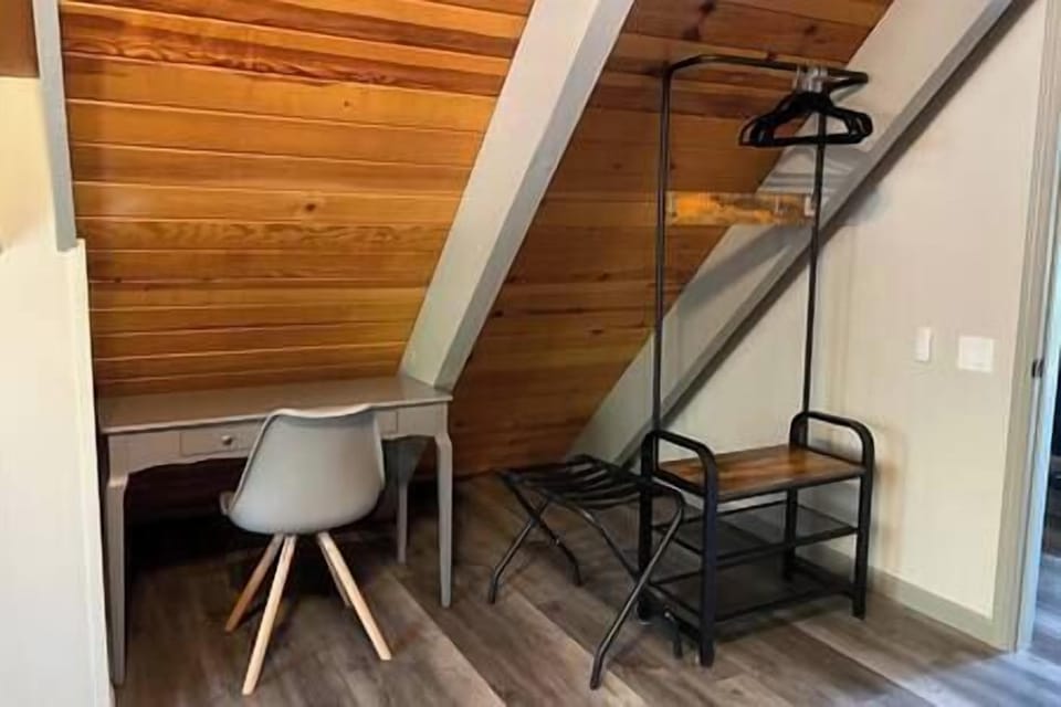 Master bedroom work space and luggage racks