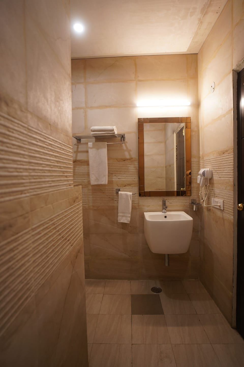 Shower, free toiletries, hair dryer, slippers