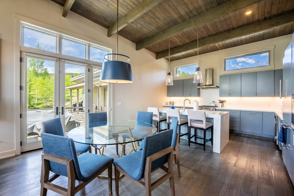 Dining area offering seating for six and additional at the kitchen island