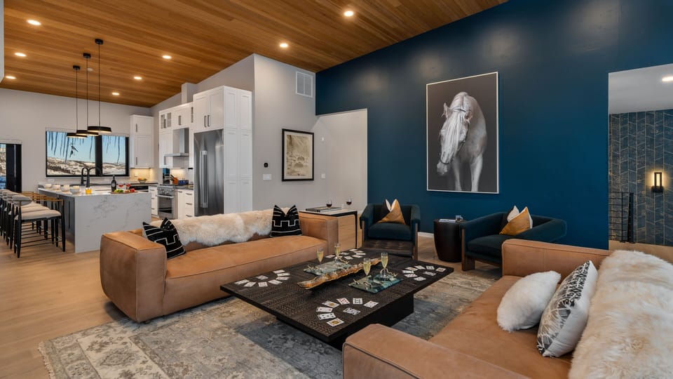 Great Room, Upper Level - Seating area with accent wall