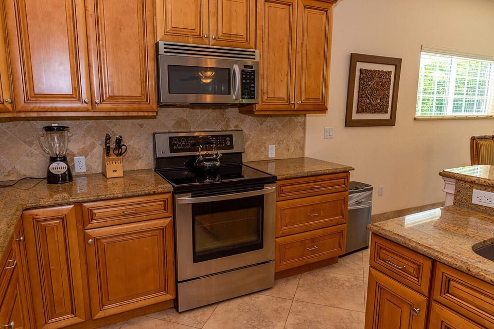 Stainless appliances and a blender for frozen drinks!