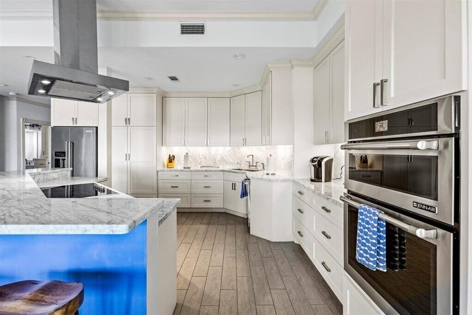 Sleek design meets culinary adventure in this stunning Galveston kitchen!