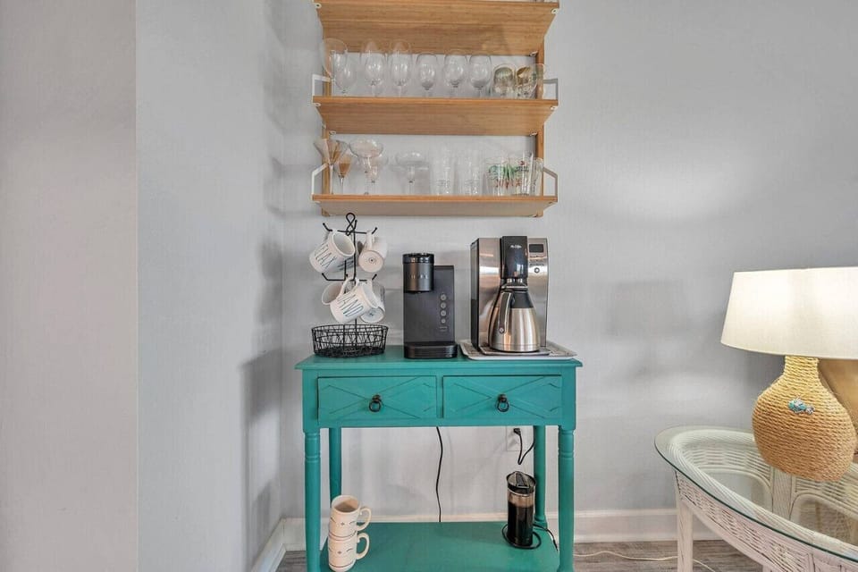 Stylish vanity w/ a bold sink and warm accents, adding character to the space.