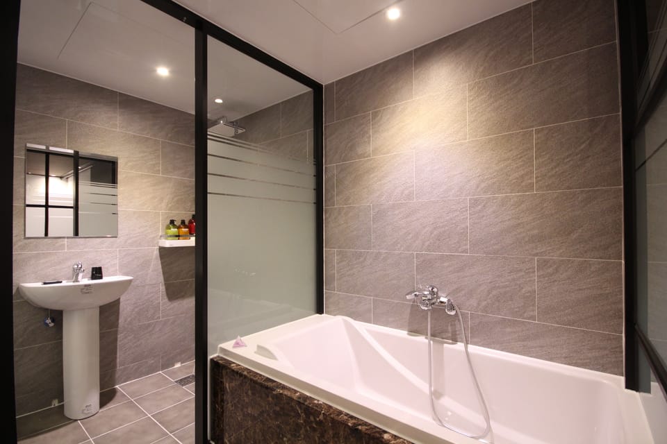 Standard Double Room | Bathroom | Shower, free toiletries, hair dryer, bathrobes