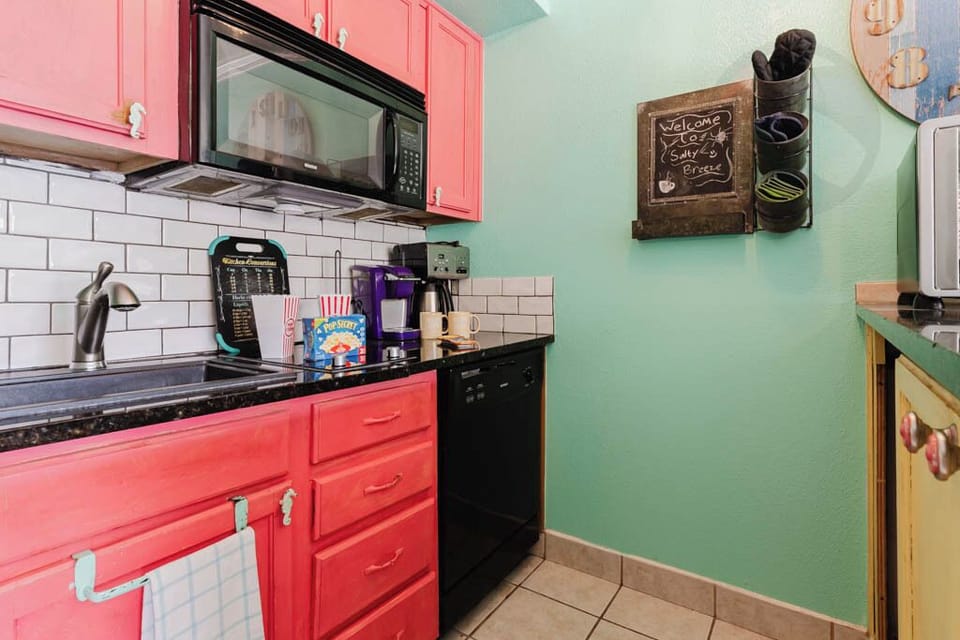 Colorful kitchen has everything needed