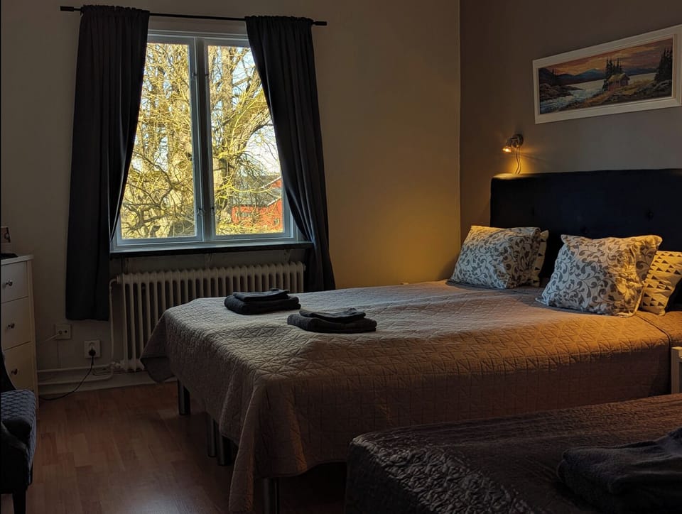 Economy Triple Room, Shared Bathroom | Individually decorated, free WiFi, bed sheets