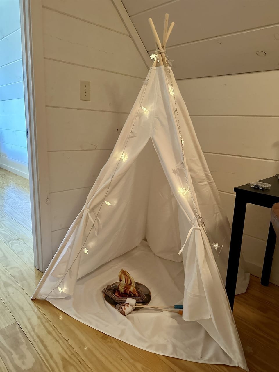 Kids love the cozy tent complete with a play fire and s'mores.  It is the perfect hideaway for little explorers.  