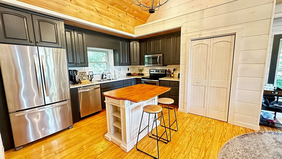 Chef's dream kitchen, fully stocked for all your cooking needs from spices to baking sheets!