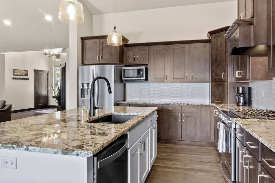 16. Full Kitchen with built in microwave, coffee maker, and kitchen counter